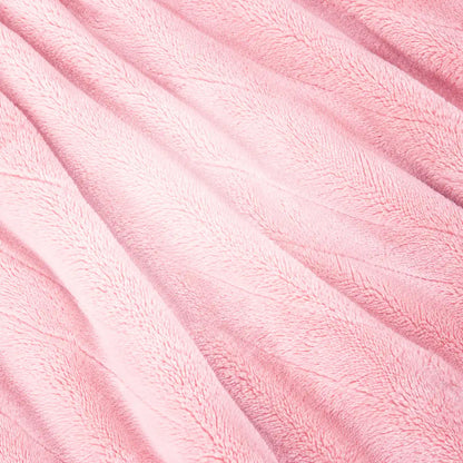 Close-up of the pink flannel fabric of the RosyRobe heated blanket