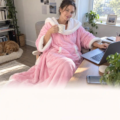 Working from home on the couch in the heated blanket, laptop on lap